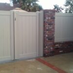 Double-Privacy-white-vinyl-Swing-Gate-with-wall-extension